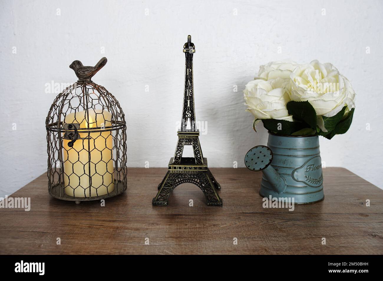 Photo inspiration: Visual Reference: Eiffel Tower And Bird Cage Home Decoration With Space Copy