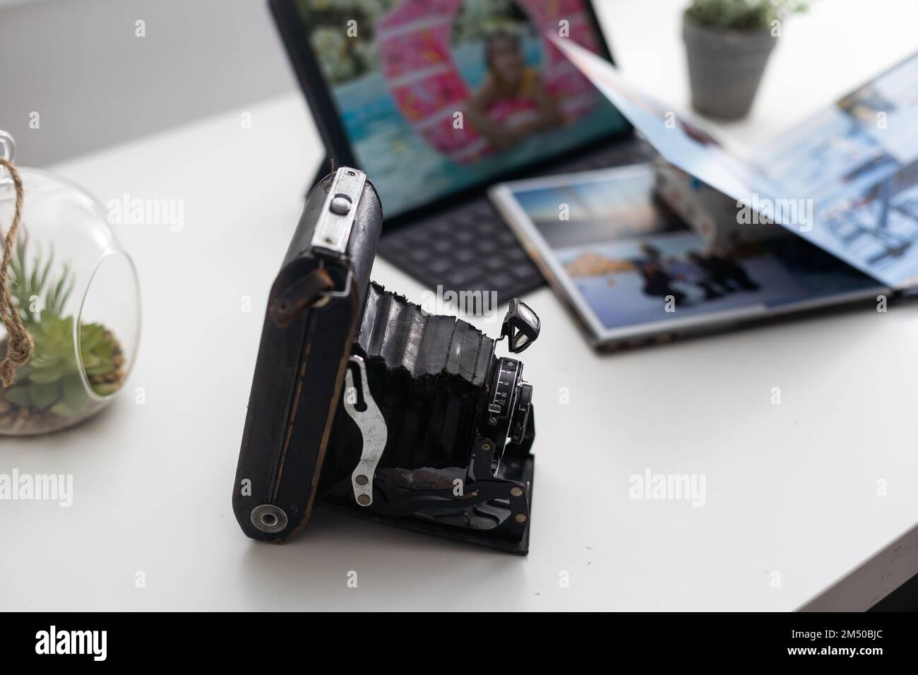 office photography desk table with laptop, tablet, camera. Top view