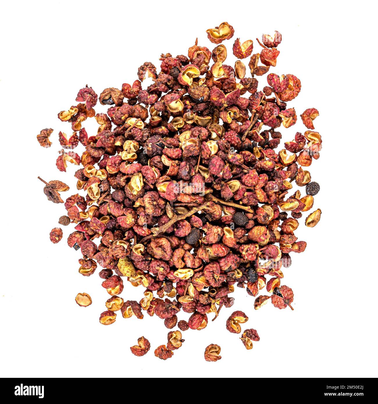 Aroma spice red cayenne pepper is scattered on a white isolated