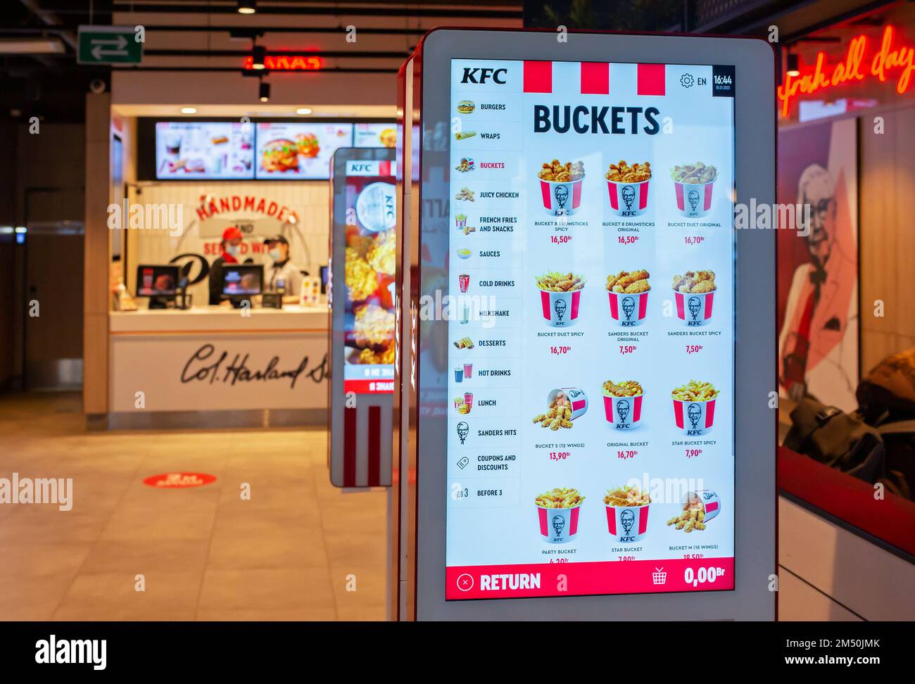 Self order kiosk machines installed inside of a KFC fast food ...