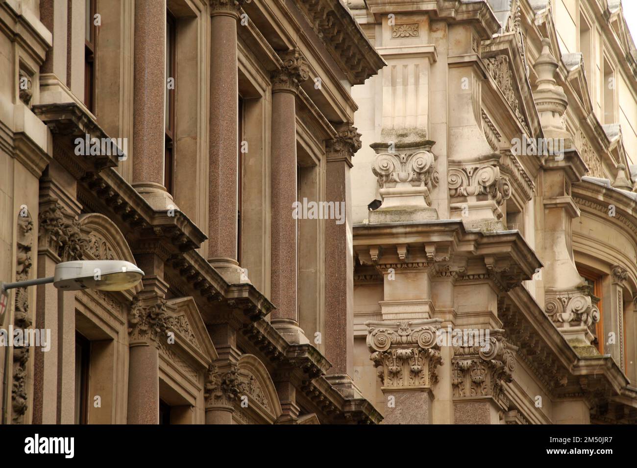 A scenic shot of buildings in a city with classic architectural designs ...