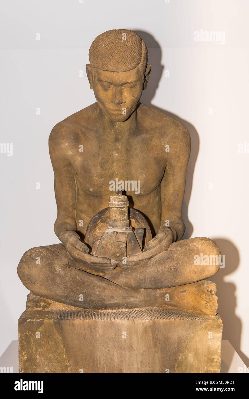 Amsterdam, Netherlands. December 2022. Ancient statue of a meditating man. High quality photo Stock Photo