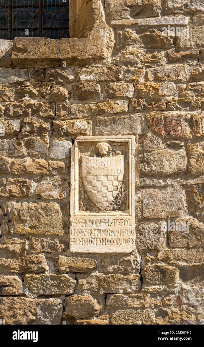 Coat of arms on the wall of Santo Spirito cenacle, near the homonym church, house of 'Salvatore Romano Foundation', Oltrarno quarter, Florence, Italy Stock Photo