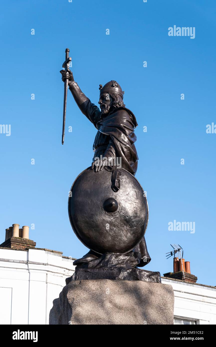 A bronze statue of Alfred the Great stands at the eastern end of The Broadway. The statue was designed by Hamo Thornycroft. Winchester, England Stock Photo