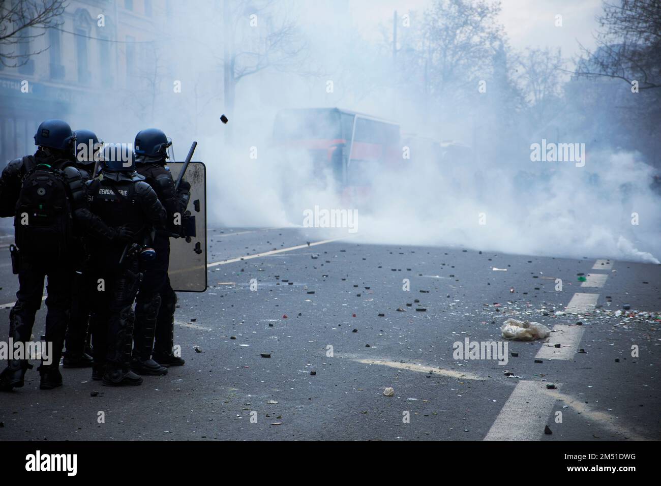 Paris, Ile de France, FRANCE. 24th Dec, 2022. Police use teargas during riots by Kurds after the killing of three Kurds in Paris. Three members of the Kurdish community in Paris were killed by a lone gunman on Friday, december 23, 2022, sparking violent riots. The man who was arrested after the crime admits racial reasons for the killings. Credit: ZUMA Press, Inc./Alamy Live News Stock Photo
