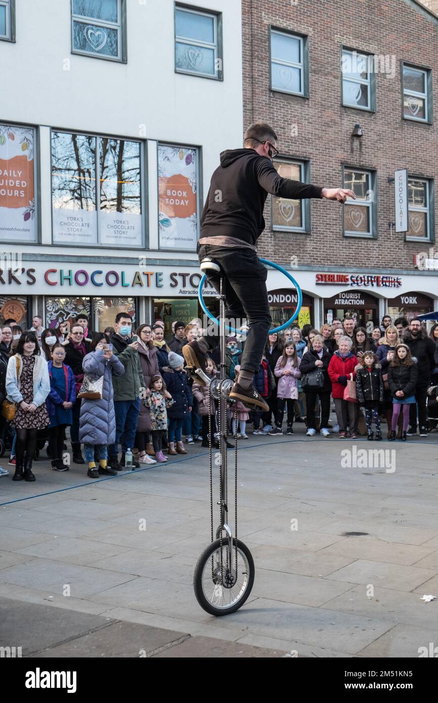 Unicycle,busker,busking,in,popular,tourist,city,in,centre,of,York