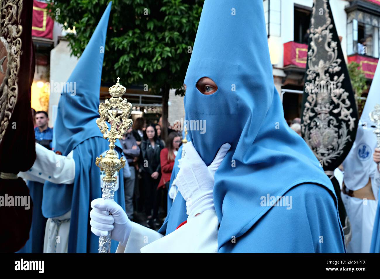 Confreres accompanying the pasos in the itinerary of the "Stations of Penance" in Sevilla Stock Photo