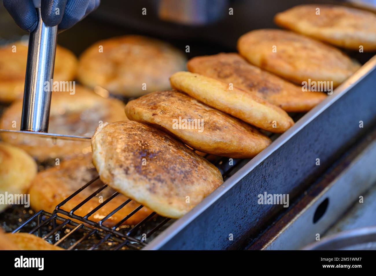 hotteok, Korean Syrupfilled Pancake Fermented flour dough shaped