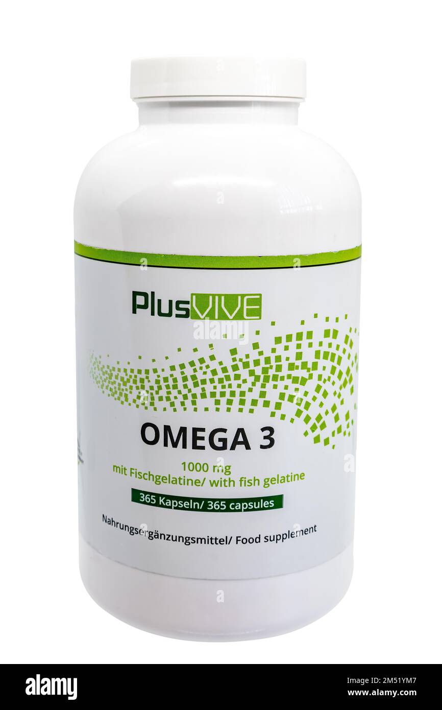 Huelva, Spain - December 24, 2022: Bottle of Omega 3 capsules with Fish Gelatine Shell, brand Plusvive. Omega-3 fats prevent heart disease and stroke, Stock Photo