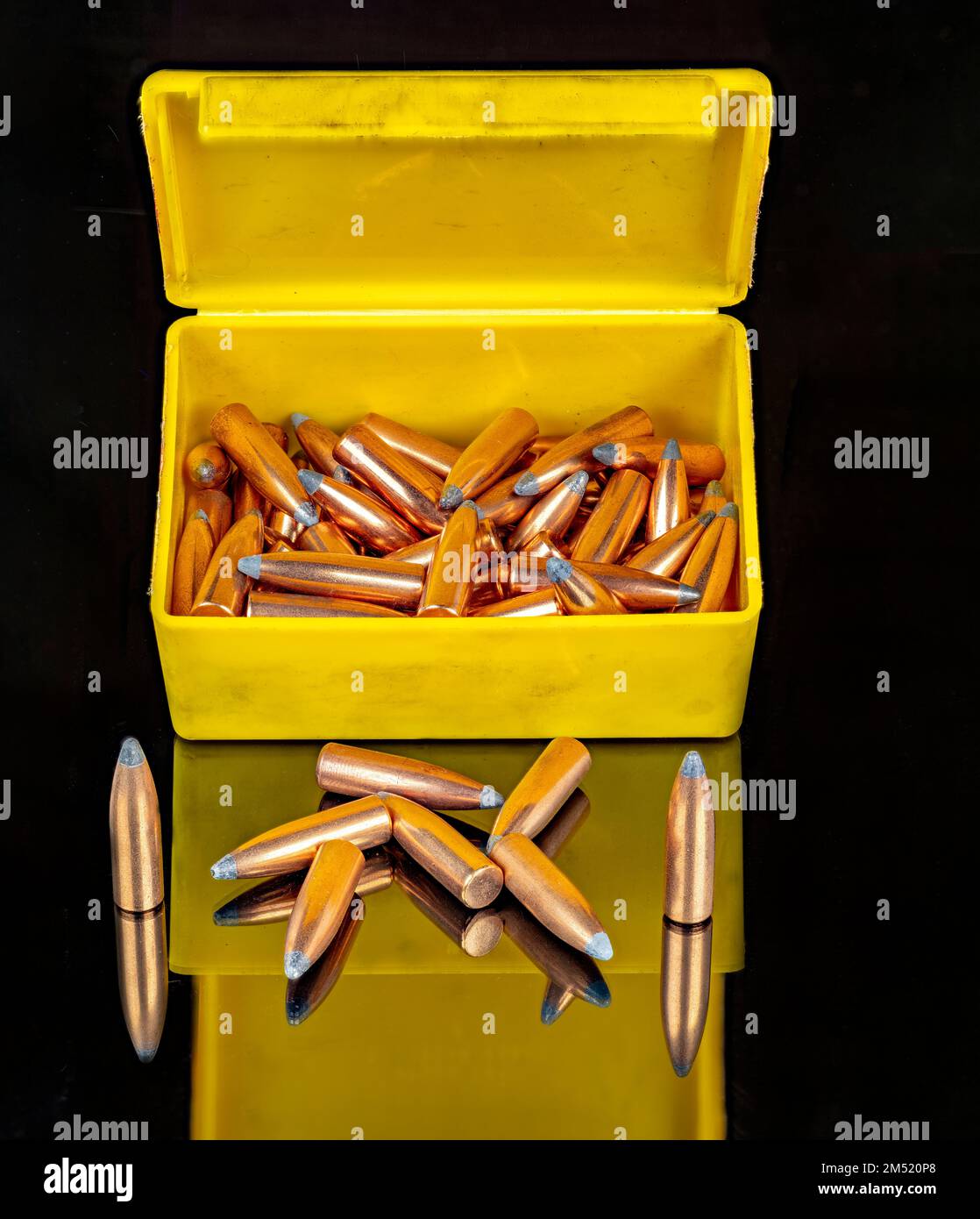 Plastic box filled with copper bullets for reloading Stock Photo Alamy