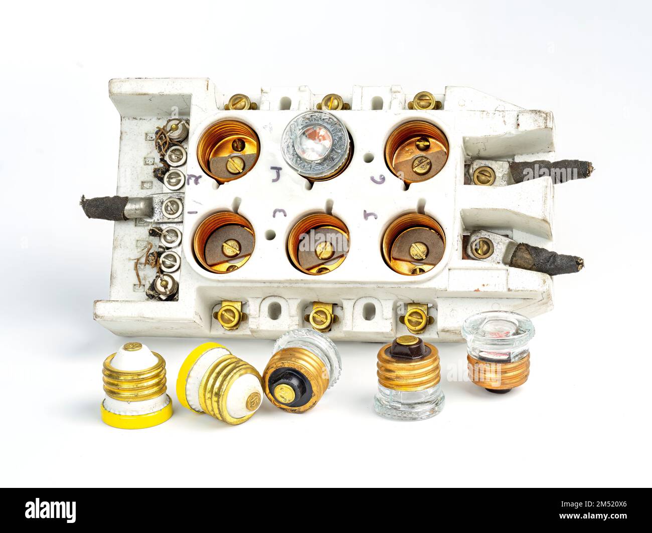 Ceramic fuse box with screw in fuses Stock Photo Alamy