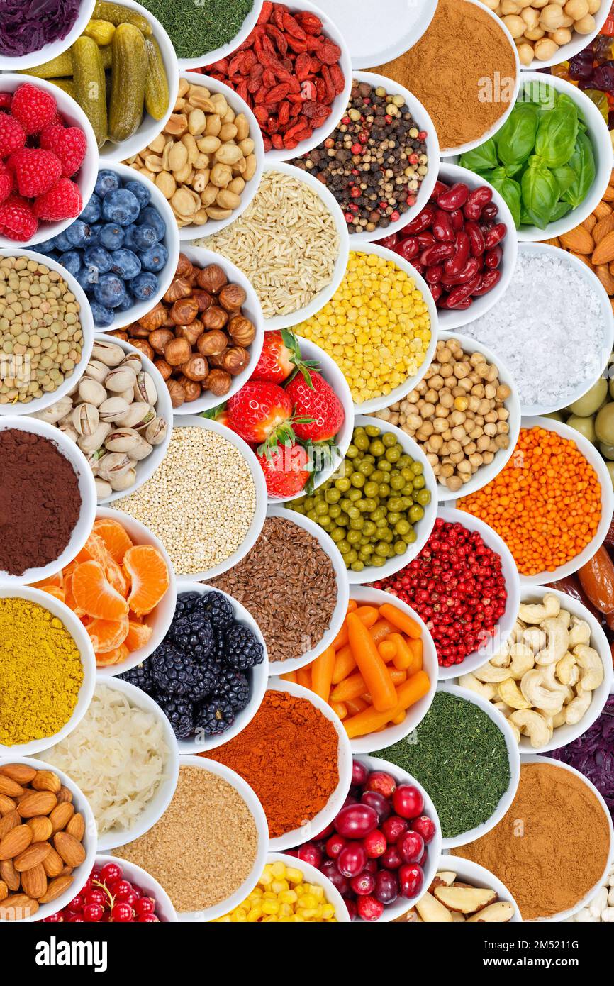 Fruits and vegetables food background spices ingredients portrait format berries from above fruit Stock Photo