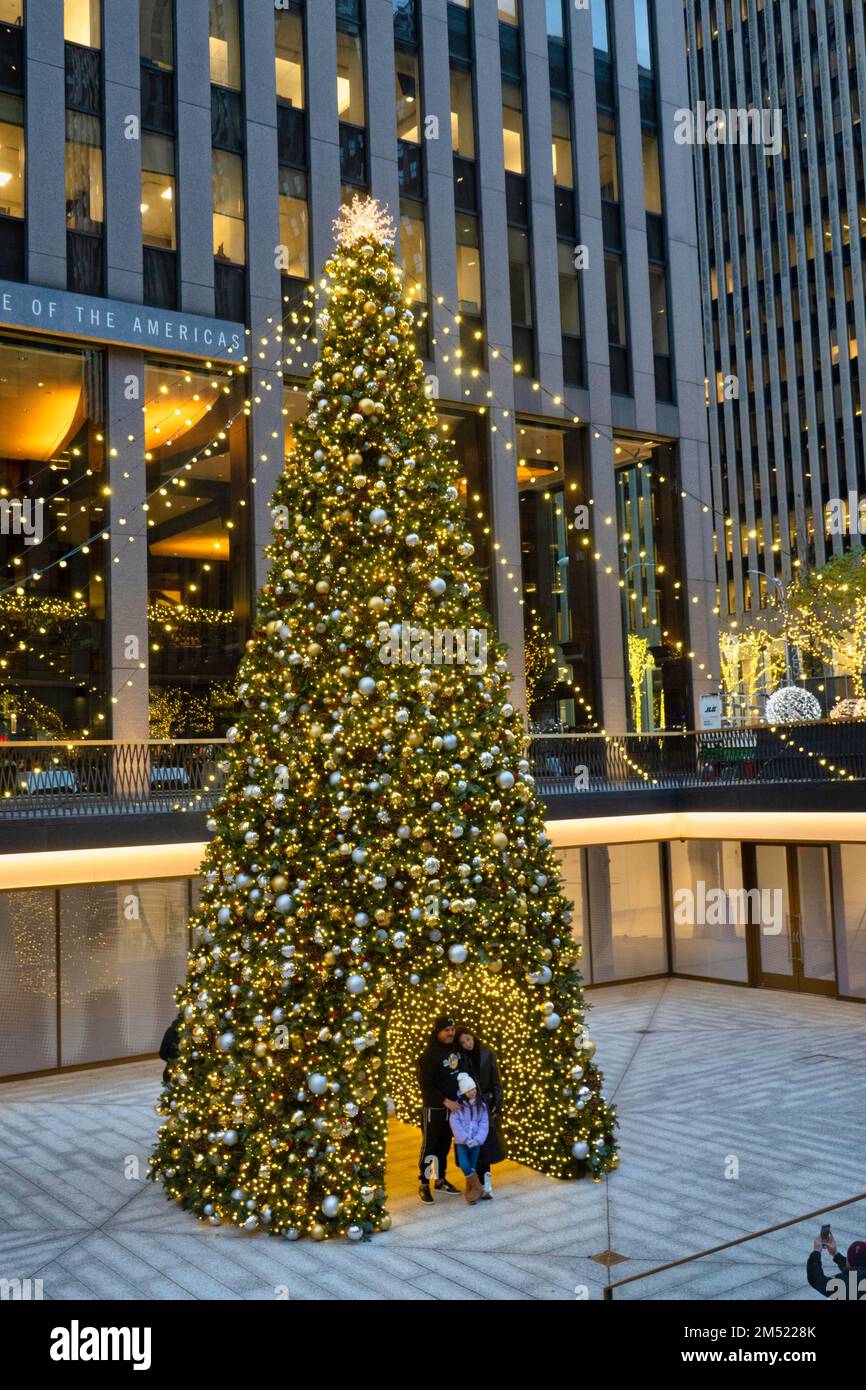 Avenue of the Americas during the holiday season features festive Christmas lights, 2022, New York City, USA Stock Photo