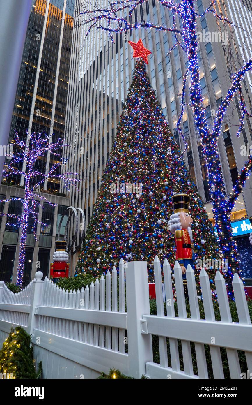 Holiday Decorations and Christmas Tree on Sixth Avenue at Fox Corner, New York City, USA  2022 Stock Photo