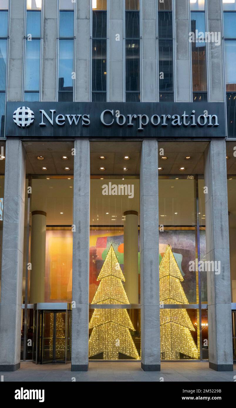 News Corporation Building with holiday Christmas trees, New York City, USA Stock Photo
