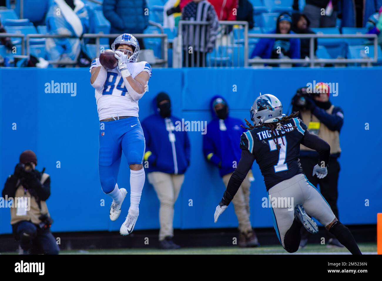 Charlotte, NC, USA. 24th Dec, 2022. Detroit Lions wide receiver Jameson  Williams (9) runs to tight end Shane Zylstra (84) after the touchdown  during the first half of the NFL matchup against