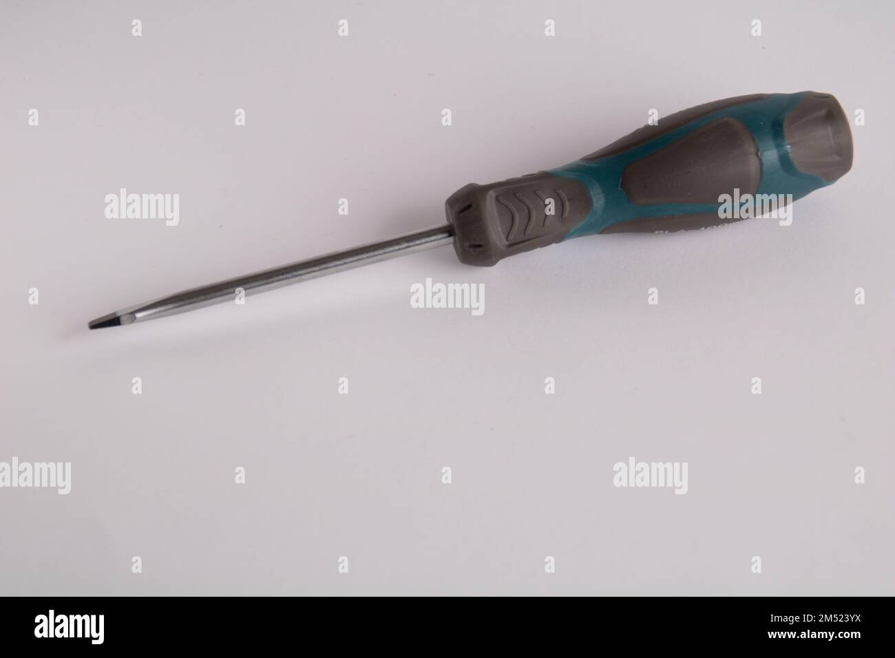 Working Screwdriver photo of a working screwdriver against a white background Stock Photo ...