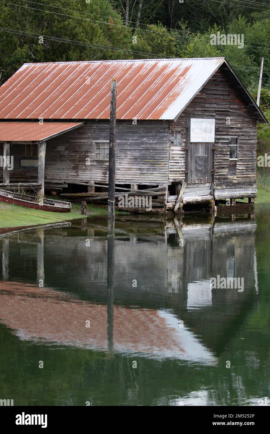 Sointulia Fisheries shed with reflection in water at Sointula, Malcolm Island ...