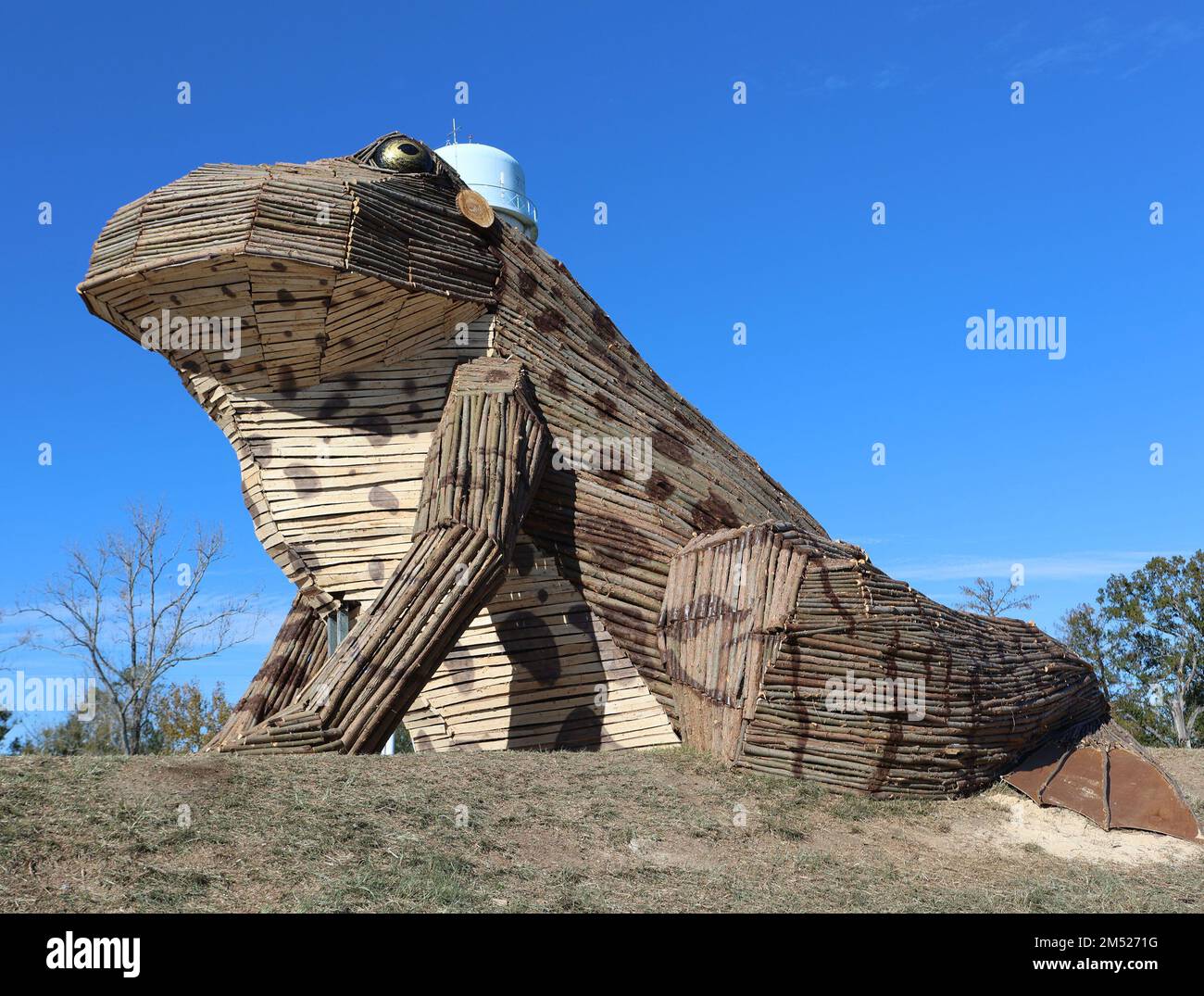 A giant Bullfrog Bonfire is displayed on the levee in Garyville