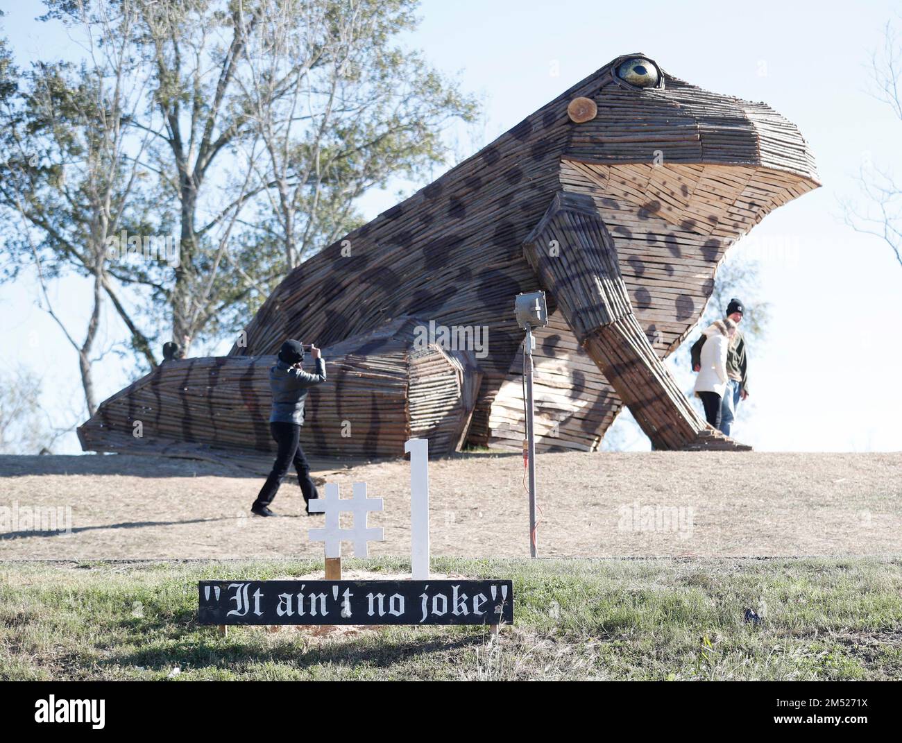 A giant Bullfrog Bonfire is displayed on the levee in Garyville, Louisiana on Friday, December