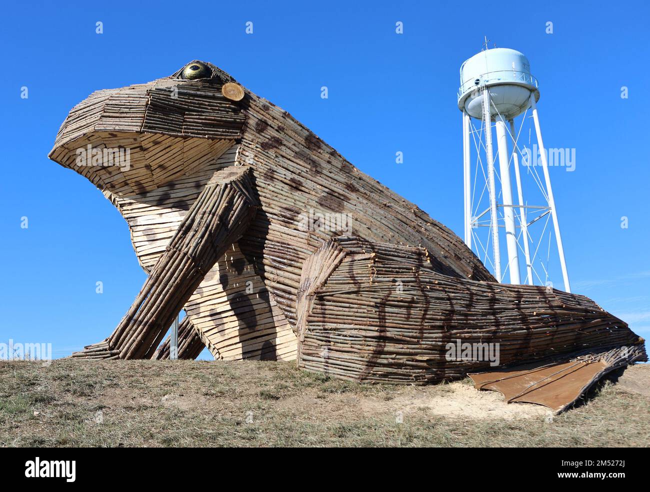 A giant Bullfrog Bonfire is displayed on the levee in Garyville