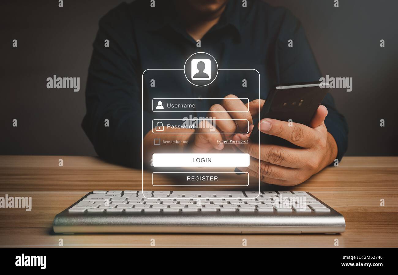 Businessman using smartphones to type user and passwords for login financial applications,  identification information security, and encryption, Conce Stock Photo