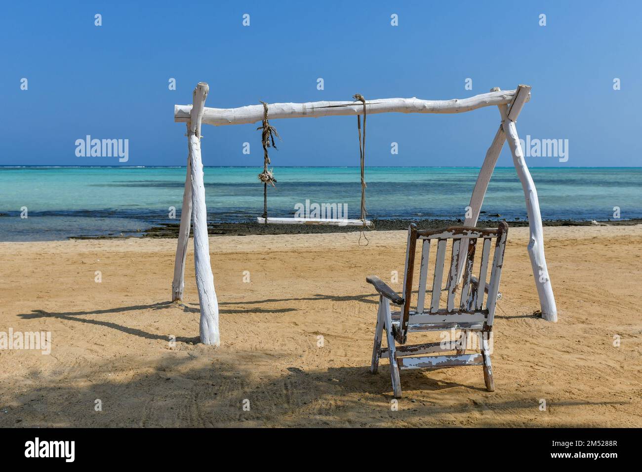 Swing on beach blue hi-res stock photography and images - Alamy