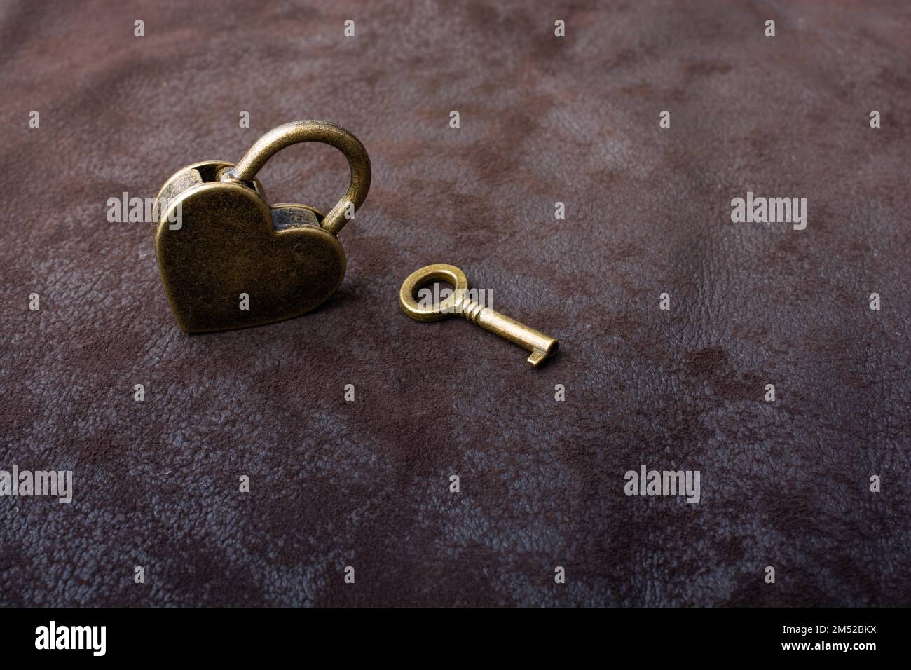 Metal padlock in heart shape as symbol of love Stock Photo - Alamy