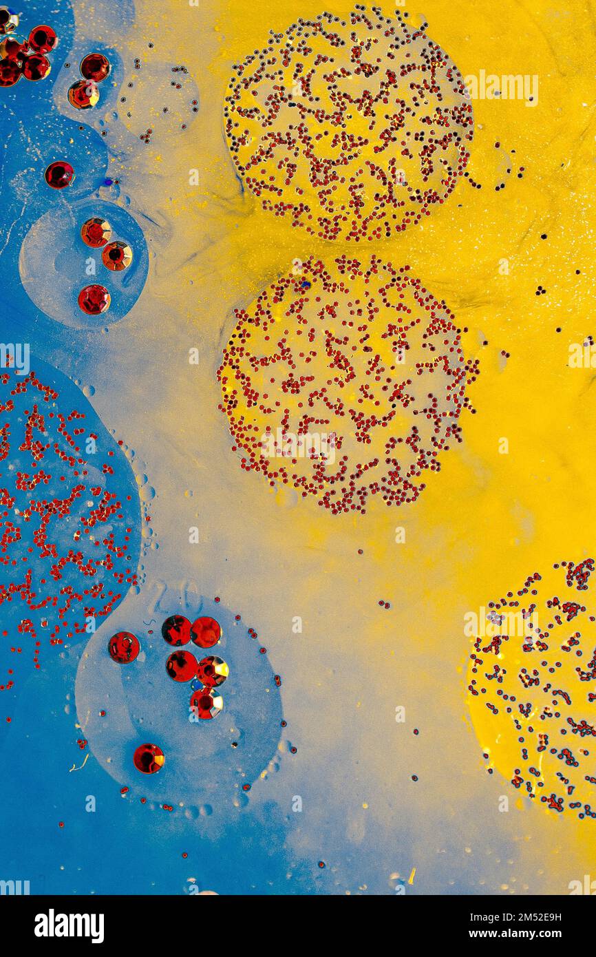 Oil bubbles inside water base form patterns Stock Photo