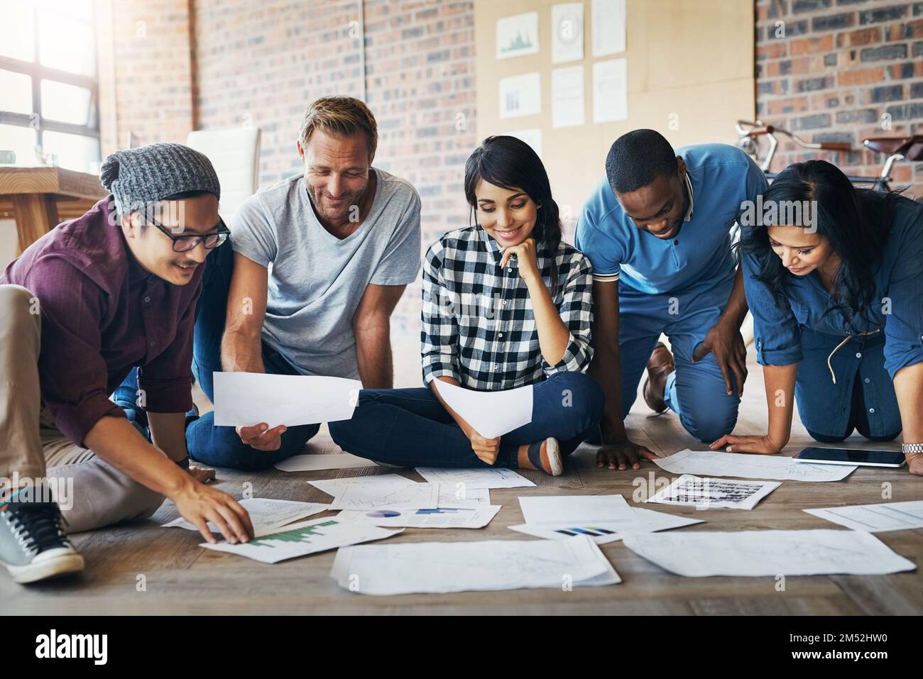 Finding ways to bring clients closer to their brand. a group of ...