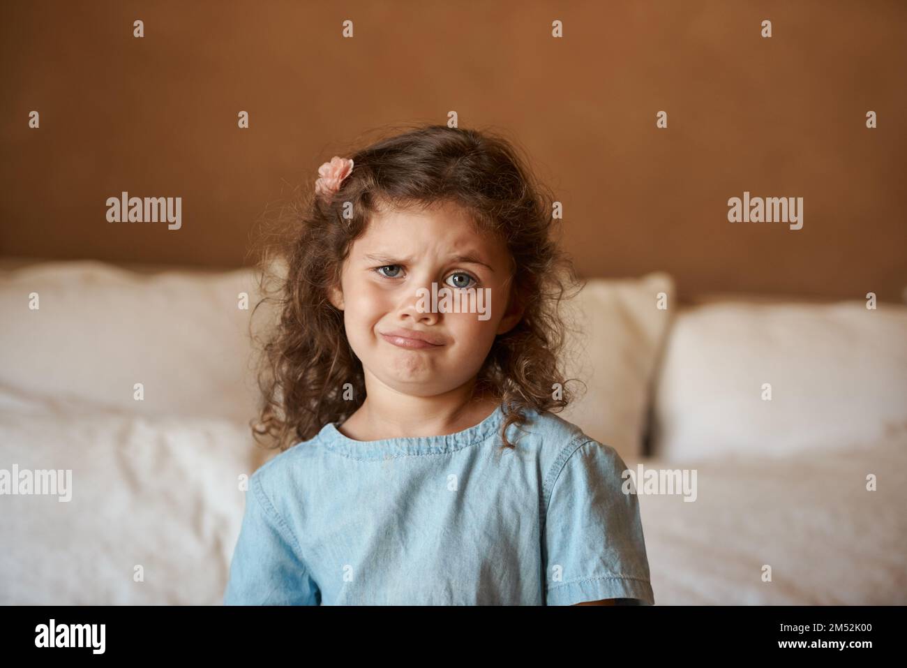 Im too old for coloring books mom. an adorable little girl at home