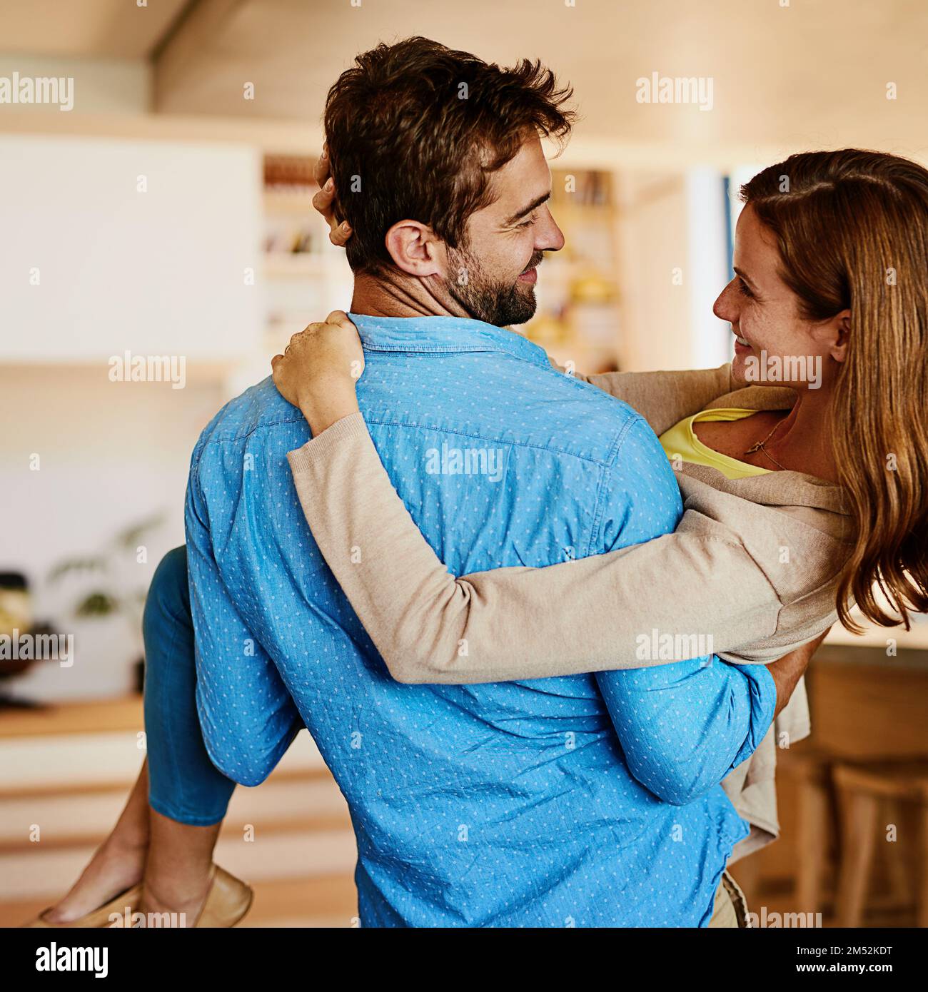 Where are you taking me rearview shot of a young man carrying his