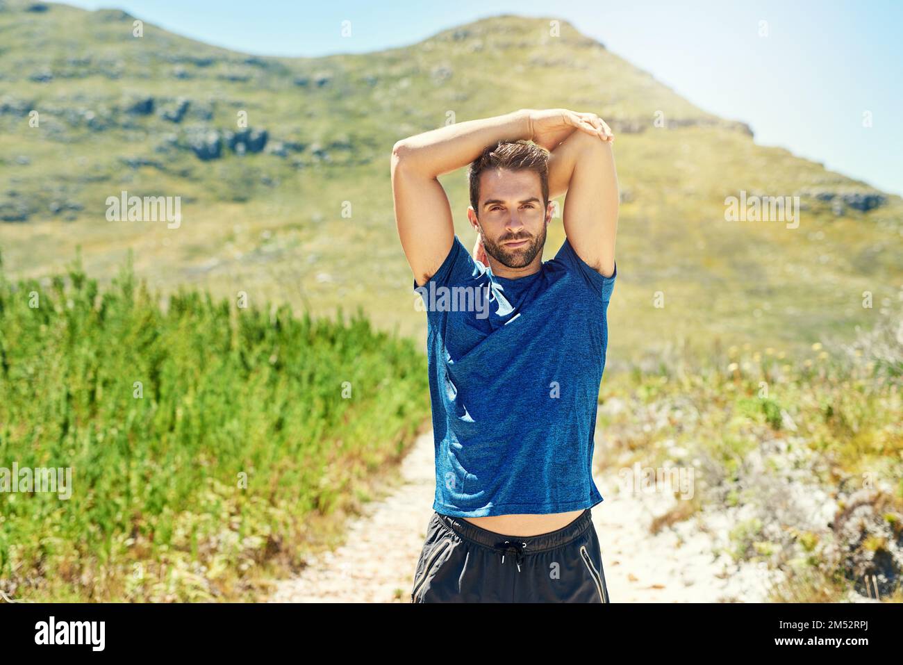 Taking the scenic route towards his fitness goals. Portrait of a young