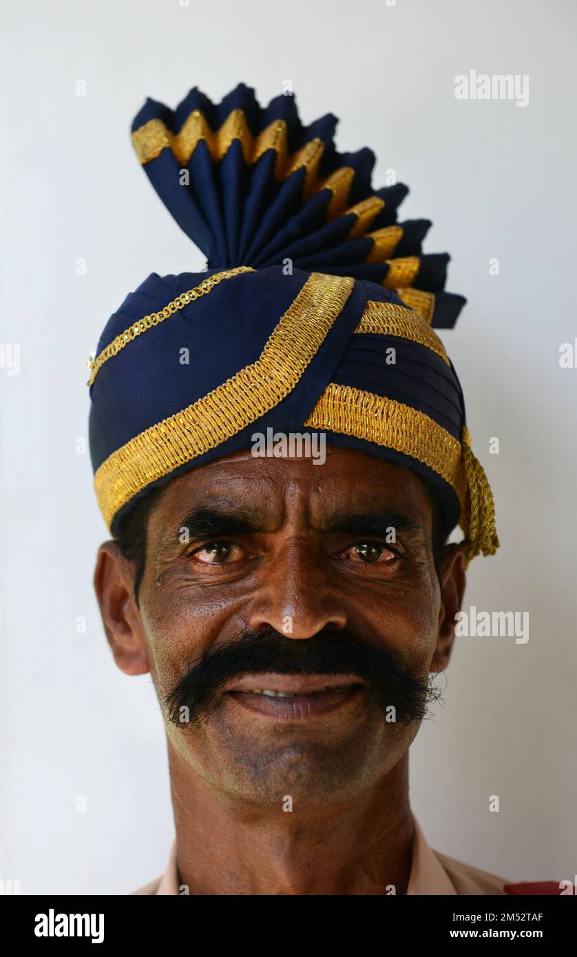 Portrait of a Tamil man wearing a uniform and a colorful turban. Madurai, Tamil Nadu, India. Stock Photo