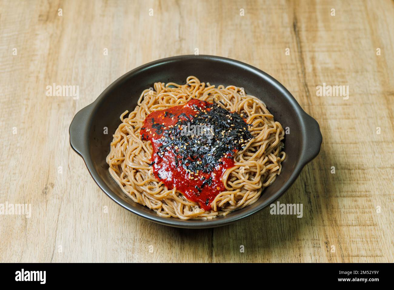 bibim memil makguksu, Korean style spicy buckwheat noodles Stock Photo