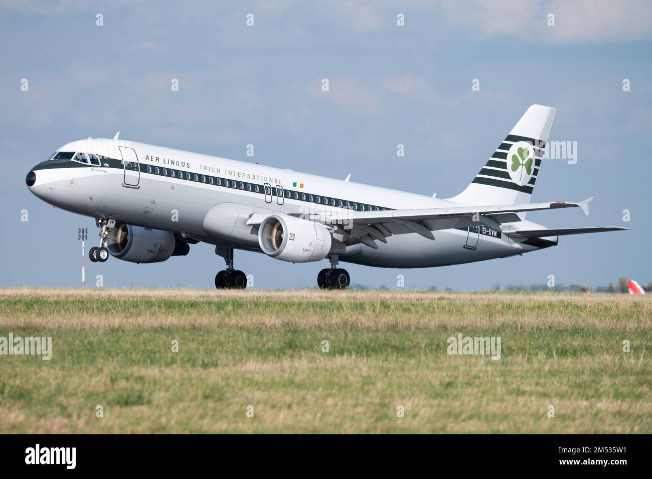 The Aer Lingus Airbus A320 in retro livery landing in Roissy Charles de Gaulle airport in Paris