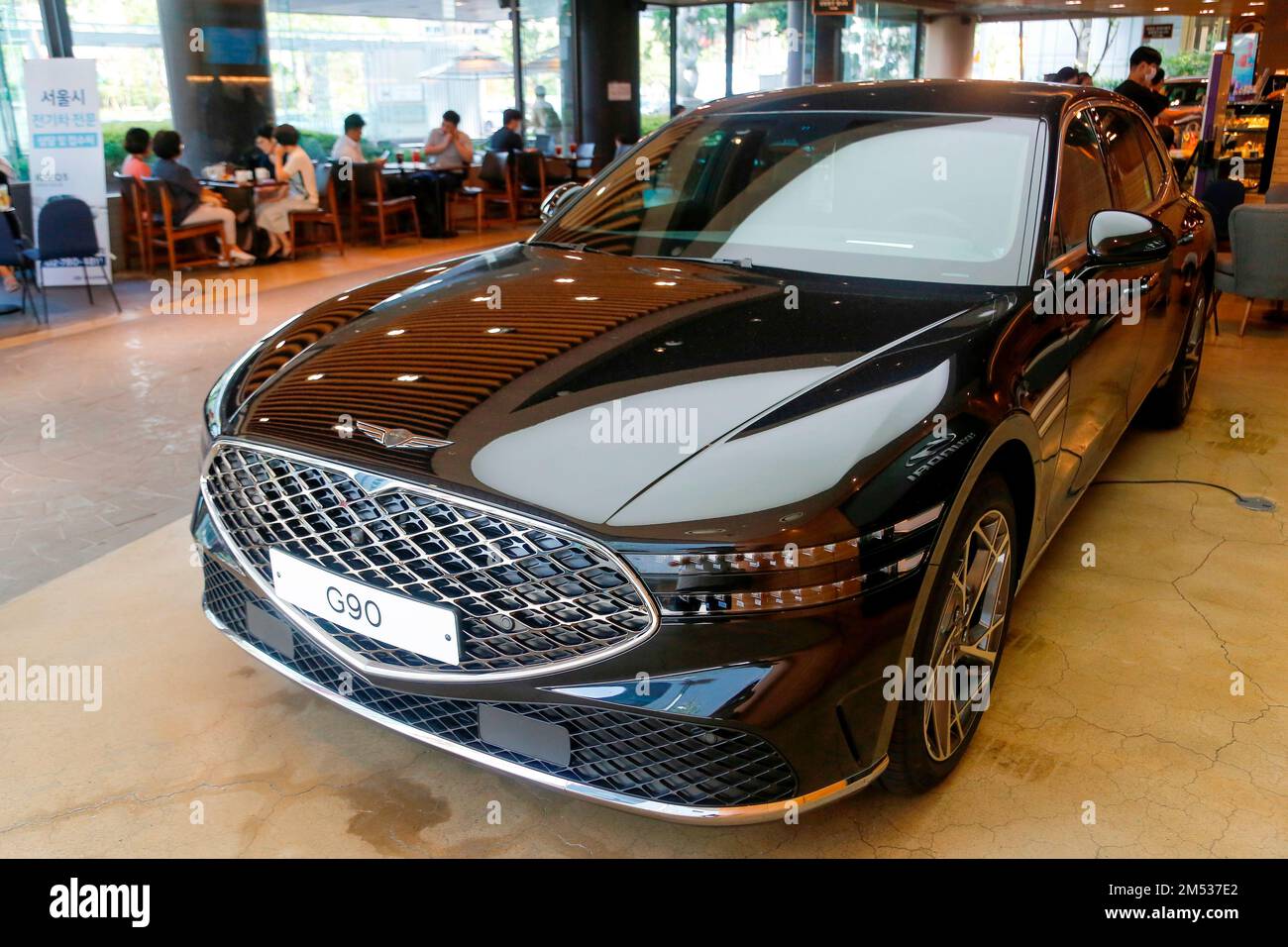 Genesis G90, Aug 5, 2022 Genesis G90 sedan is displayed at a cafe in