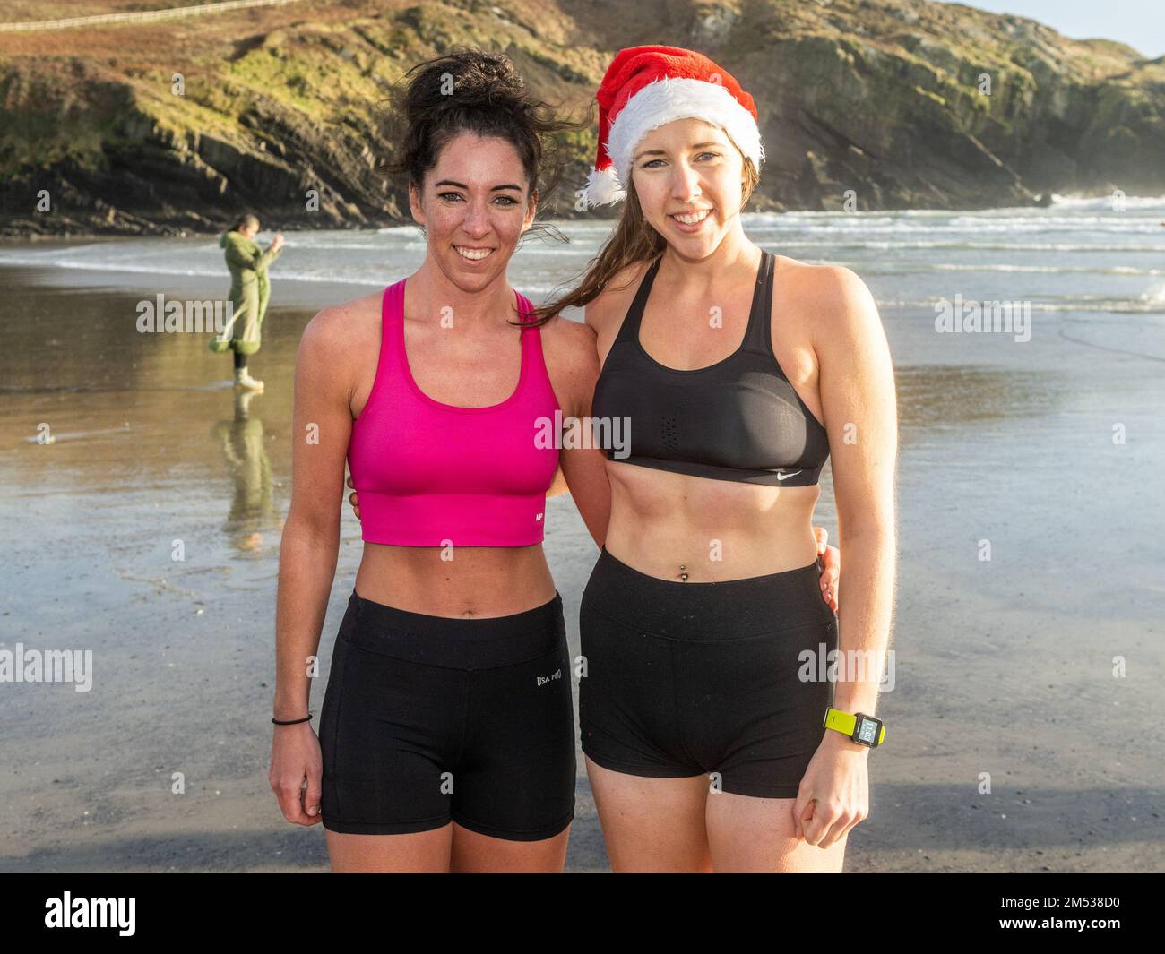 Rosscarbery, West Cork, Ireland. 25th Dec, 2022. Hundreds of people took part in the annual Christmas Swim at the Warren Beach in Rosscarbery this morning. Taking part in the swim were SInéad and Claire O'Regan from Rosscarbery. Credit: AG News/Alamy Live News Stock Photo