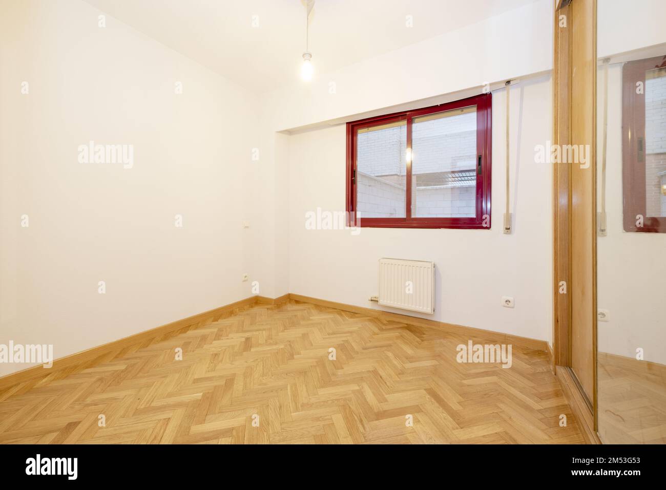 Empty bedroom with dark red anodized aluminum window, French oak ...