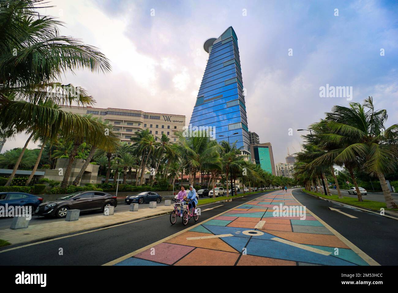 Jeddah, Saudi Arabia. 23 Dec 2022 -   happy people riding a bicycle jeddah city colorful streets Stock Photo