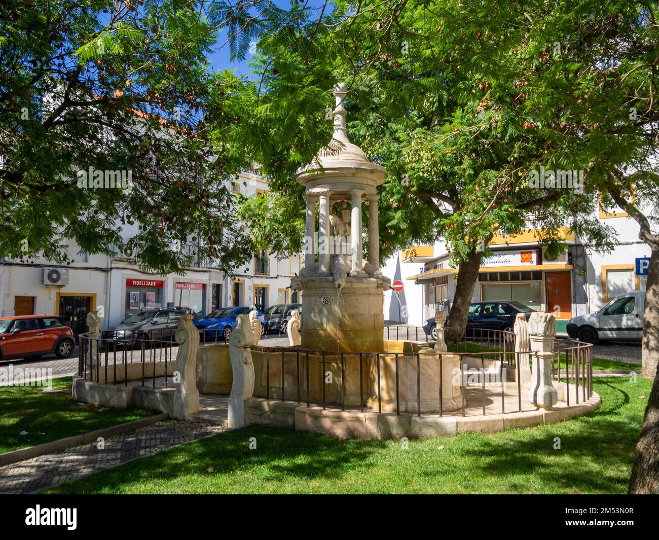Misericordia Fountain in the trees shade of Elvas summer Stock Photo