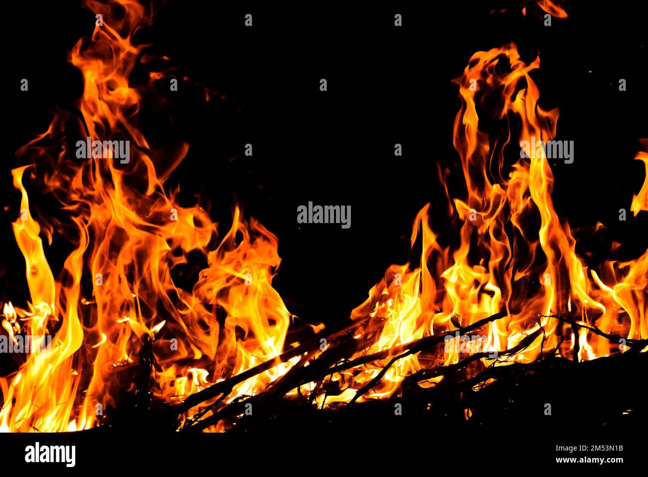 Fire sparks isolated on black background Stock Photo
