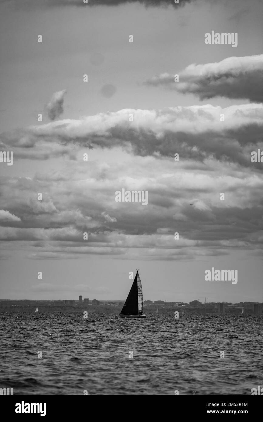 Lonely boat ocean Black and White Stock Photos & Images Alamy