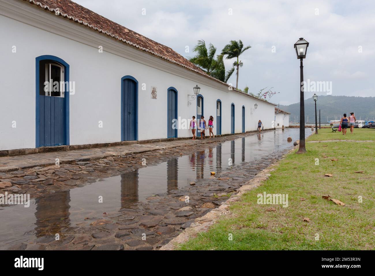 Paraty, RJ, Brazil. 27 December, 2012. A general view shows historic buildings and cobblestone paved streets flooded by incoming tide in the Historic Center District of Paraty, Rio de Janeiro, Brazil. The historic center of Paraty, were inscribed on UNESCO World Heritage List in 2019 under the title 'Paraty and Ilha Grande'. Stock Photo