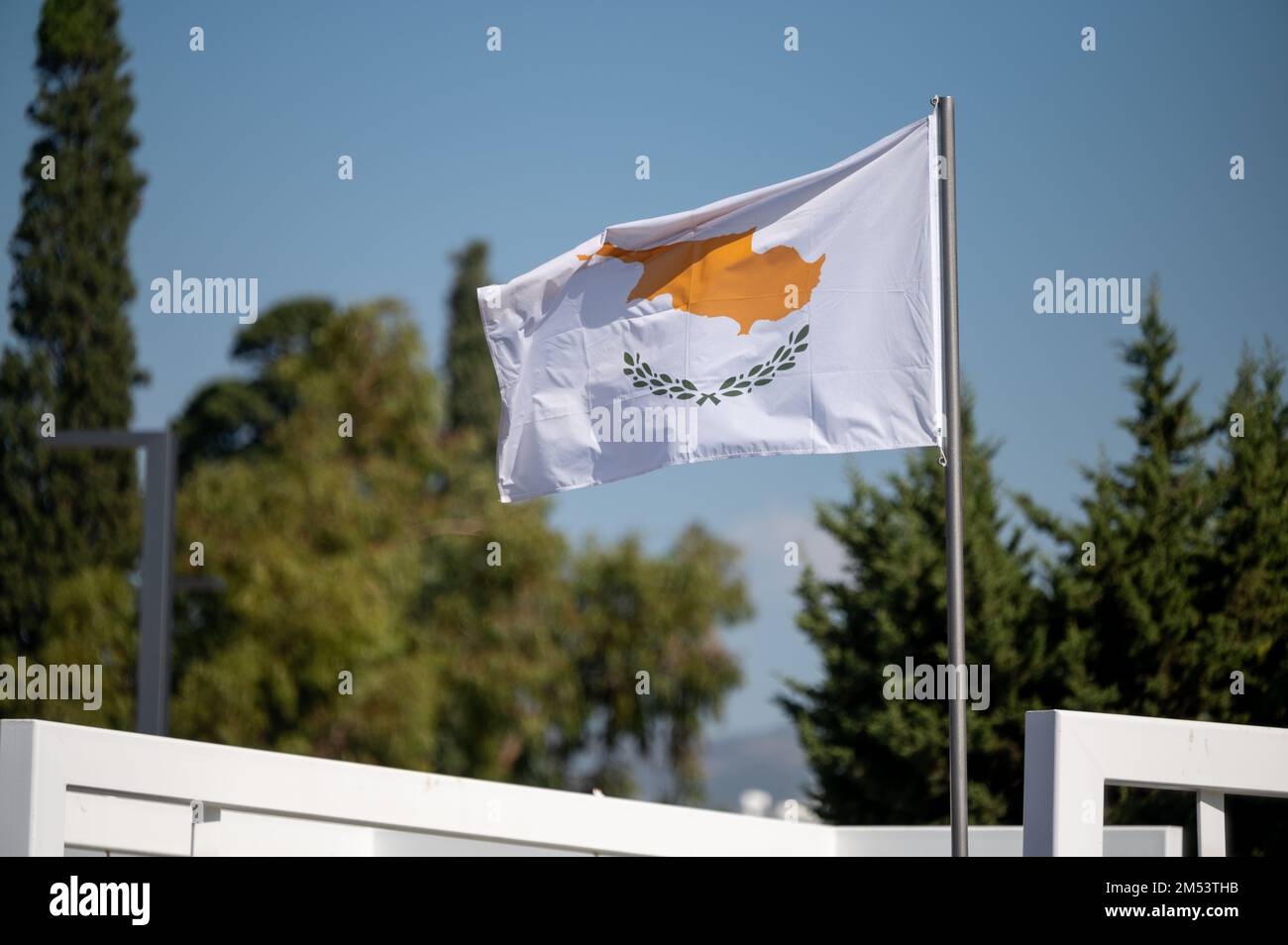 Cyprus flag flying from a flagpole Stock Photo