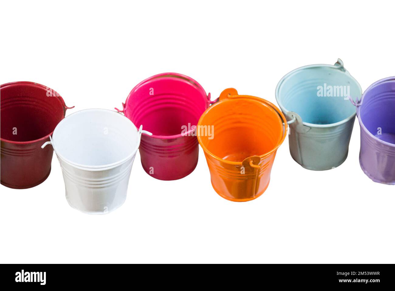 Multicolored small metal buckets. Decorative buckets in different