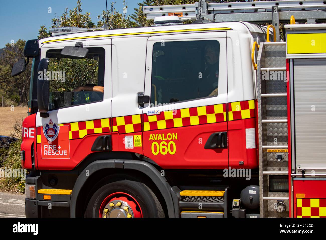 NSW Fire and Rescue emergency services and fire brigade tender at Palm Beach in Sydney,Australia Stock Photo