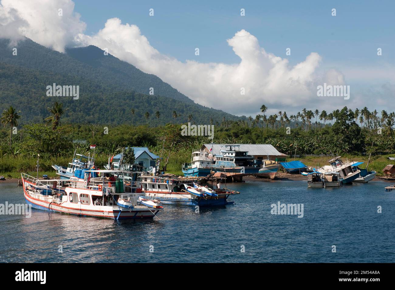 Indonesian fishing boats in small bay, Halmahera, Moluccas, Indonesia ...