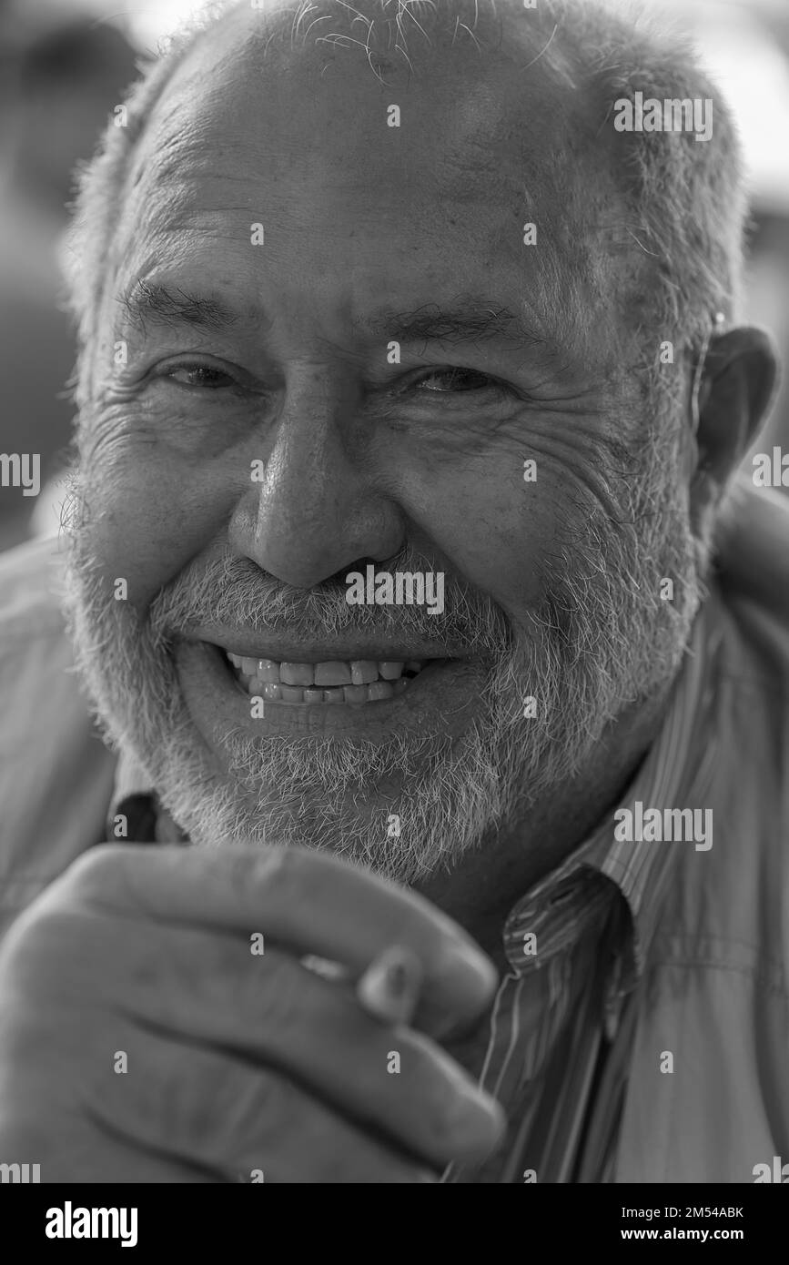 Portrait of a laughing gentleman with beard and cigarette, Bavaria, Germany Stock Photo