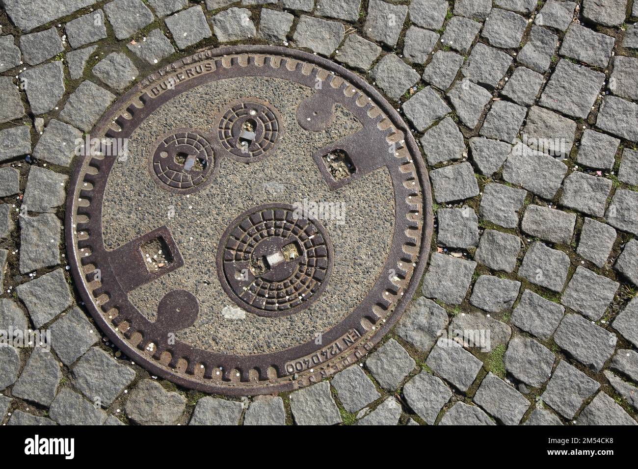 Manhole cover with enclosed three cover, bottom, paving stones ...